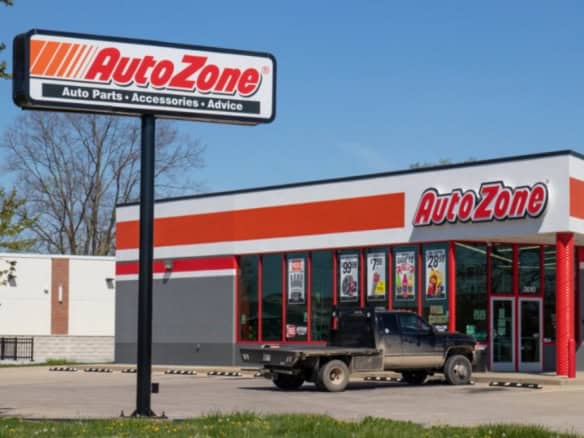 AutoZone NNN property for sale — freestanding single-tenant auto parts store with pylon sign and customer parking
